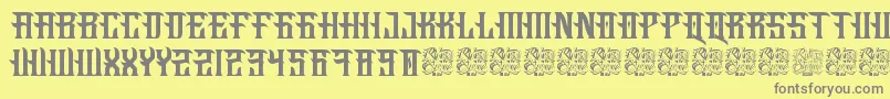 Fucking Hostile-fontti – harmaat kirjasimet keltaisella taustalla