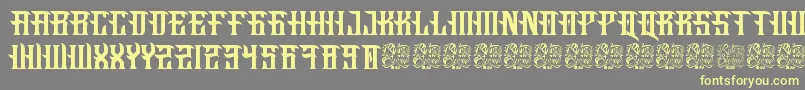 フォントFucking Hostile – 黄色のフォント、灰色の背景