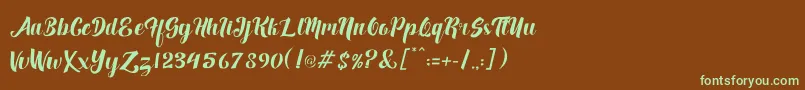 フォントFuister – 緑色の文字が茶色の背景にあります。