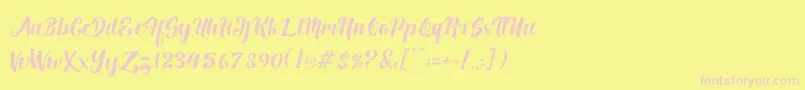 Fuister-fontti – vaaleanpunaiset fontit keltaisella taustalla
