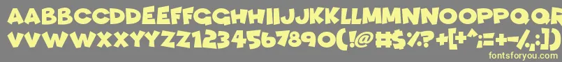 Funhouse Font – Yellow Fonts on Gray Background