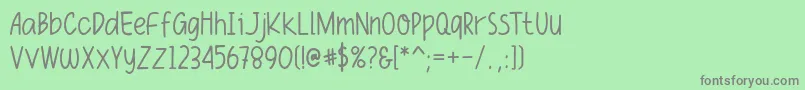 フォントFuniko – 緑の背景に灰色の文字