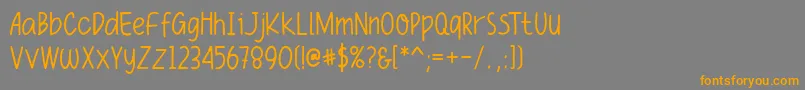 フォントFuniko – オレンジの文字は灰色の背景にあります。