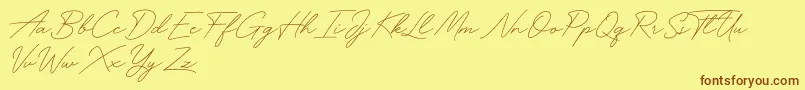 Więcej informacji o czcionce Funky Signature Czcionka Funky Signature – brązowe czcionki na żółtym tle