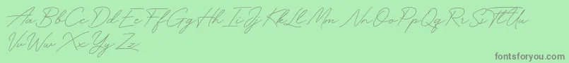 Funky Signature Font – Gray Fonts on Green Background