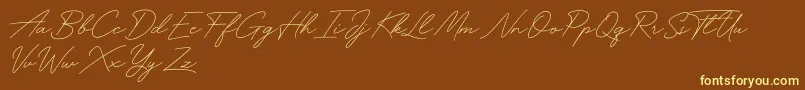 Funky Signature-Schriftart – Gelbe Schriften auf braunem Hintergrund