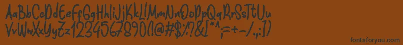 Funnis Font D by 7NTypes Font – Black Fonts on Brown Background