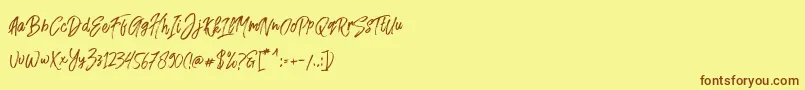 Fusterd Brush-Schriftart – Braune Schriften auf gelbem Hintergrund