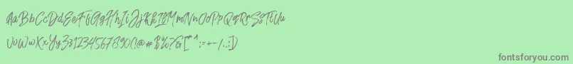 Fonte Fusterd Brush – fontes cinzas em um fundo verde