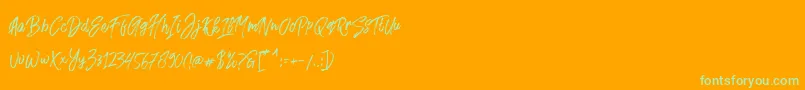 Fusterd Brush-Schriftart – Grüne Schriften auf orangefarbenem Hintergrund