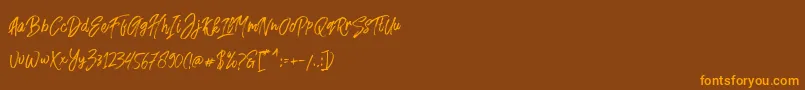 Fusterd Brush Font – Orange Fonts on Brown Background