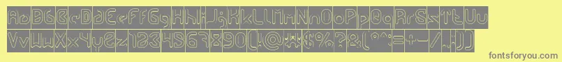 FUTURE Hollow Inverse-fontti – harmaat kirjasimet keltaisella taustalla