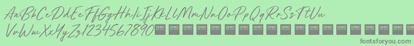 Weitere Informationen zur Future Shock Demo-Schriftart Future Shock Demo-Schriftart – Graue Schriften auf grünem Hintergrund