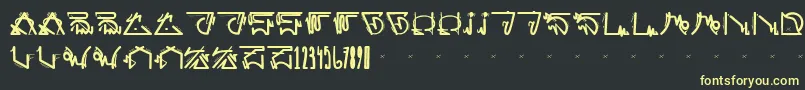 フォントfuturista – 黒い背景に黄色の文字