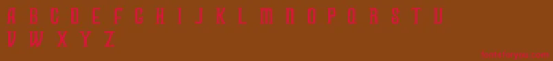 フォントFUZZY bold demo – 赤い文字が茶色の背景にあります。