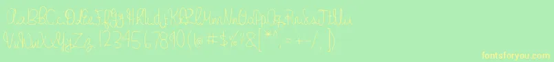 フォントgabbi s handwriting – 黄色の文字が緑の背景にあります