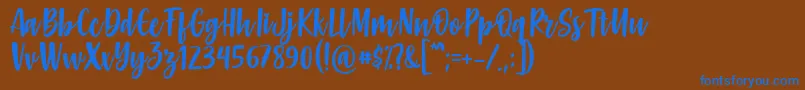 Gabelisa Font by Keithzo 7NTypes Font – Blue Fonts on Brown Background