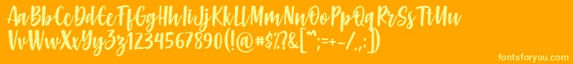 Gabelisa Font by Keithzo 7NTypes Font – Yellow Fonts on Orange Background