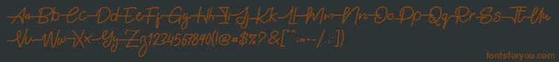 Gabuek Script Font – Brown Fonts on Black Background