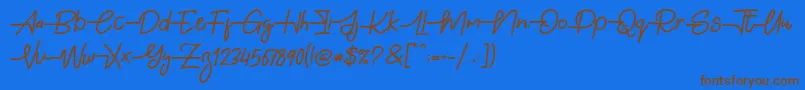 Gabuek Script-Schriftart – Braune Schriften auf blauem Hintergrund