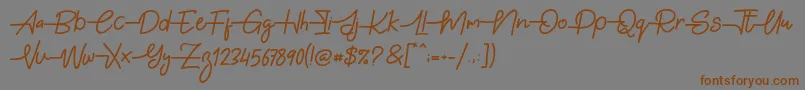 Gabuek Script-fontti – ruskeat fontit harmaalla taustalla