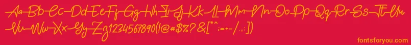 フォントGabuek Script – 赤い背景にオレンジの文字