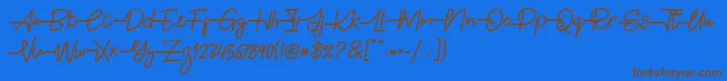 Fonte Gabuek Script – fontes marrons em um fundo azul