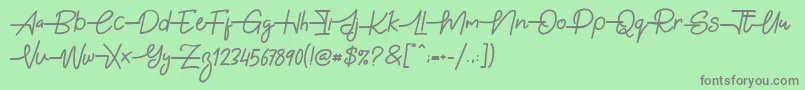 フォントGabuek Script – 緑の背景に灰色の文字