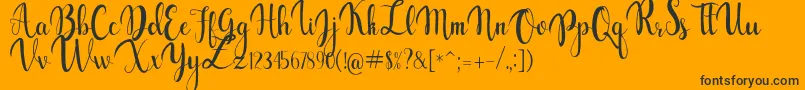 gabylia-Schriftart – Schwarze Schriften auf orangefarbenem Hintergrund