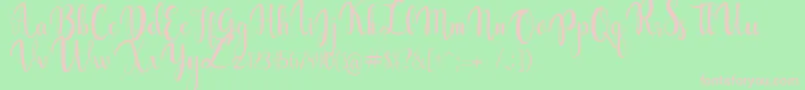 gabylia-fontti – vaaleanpunaiset fontit vihreällä taustalla