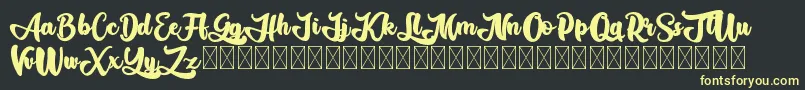 Gadimon Font – Yellow Fonts on Black Background