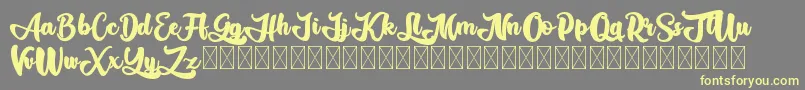 Gadimon Font – Yellow Fonts on Gray Background