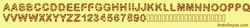 フォントGaelleFont12 – 茶色の文字が黄色の背景にあります。
