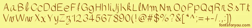 フォントgaellefont403 – 茶色の文字が黄色の背景にあります。