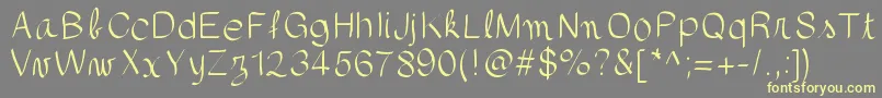 gaellefont403-fontti – keltaiset fontit harmaalla taustalla