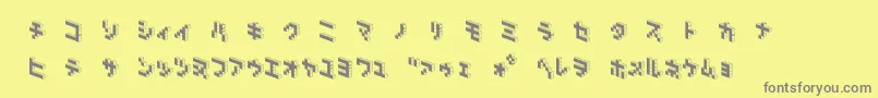 DemoncubicblockNkpBlack Font – Gray Fonts on Yellow Background