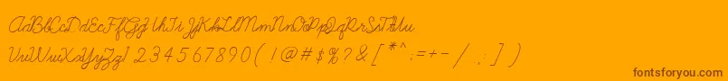 Galatee-Schriftart – Braune Schriften auf orangefarbenem Hintergrund