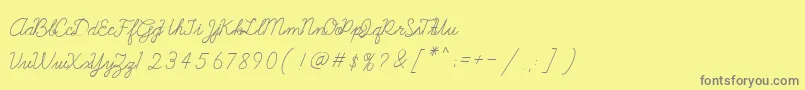 フォントGalatee – 黄色の背景に灰色の文字
