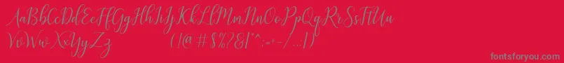 フォントgalatia – 赤い背景に灰色の文字