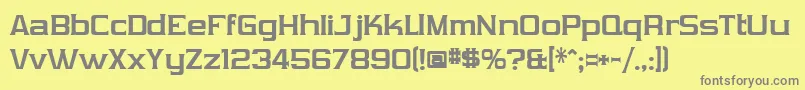 フォントVibrocentricBold – 黄色の背景に灰色の文字