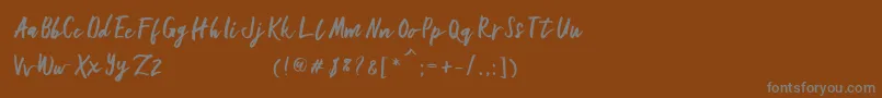 フォントGallant – 茶色の背景に灰色の文字