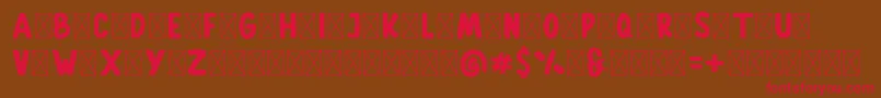Gallicide Demo Font – Red Fonts on Brown Background
