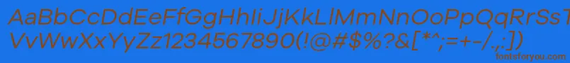 Fonte Galyon Italic – fontes marrons em um fundo azul