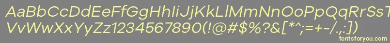 Galyon Italic-fontti – keltaiset fontit harmaalla taustalla
