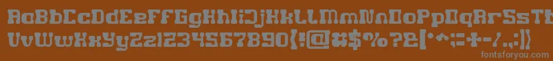 GAME ROBOT-fontti – harmaat kirjasimet ruskealla taustalla