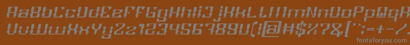 GAMER Italic-fontti – harmaat kirjasimet ruskealla taustalla