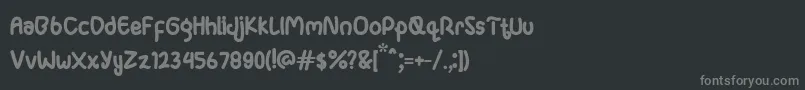 Ganula-Schriftart – Graue Schriften auf schwarzem Hintergrund