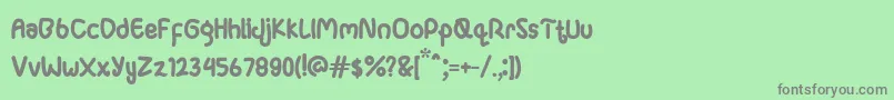Ganula Font – Gray Fonts on Green Background
