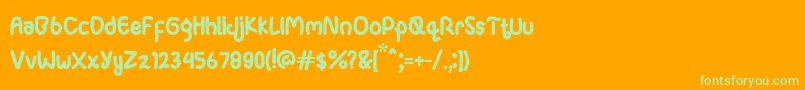 Ganula-Schriftart – Grüne Schriften auf orangefarbenem Hintergrund