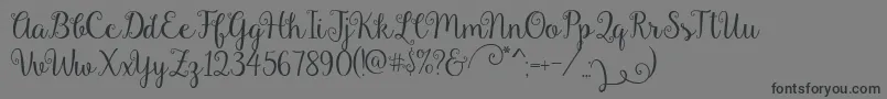 Gardenia Font – Black Fonts on Gray Background